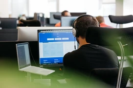 person looking at computer screen