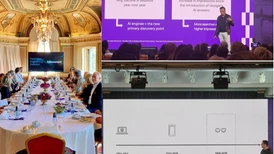 Persons sitting round a dinner table in a golden room, and person presenting purple slides